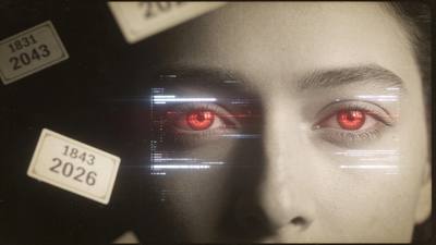 A face half-lit, both eyes replaced by red digital readouts